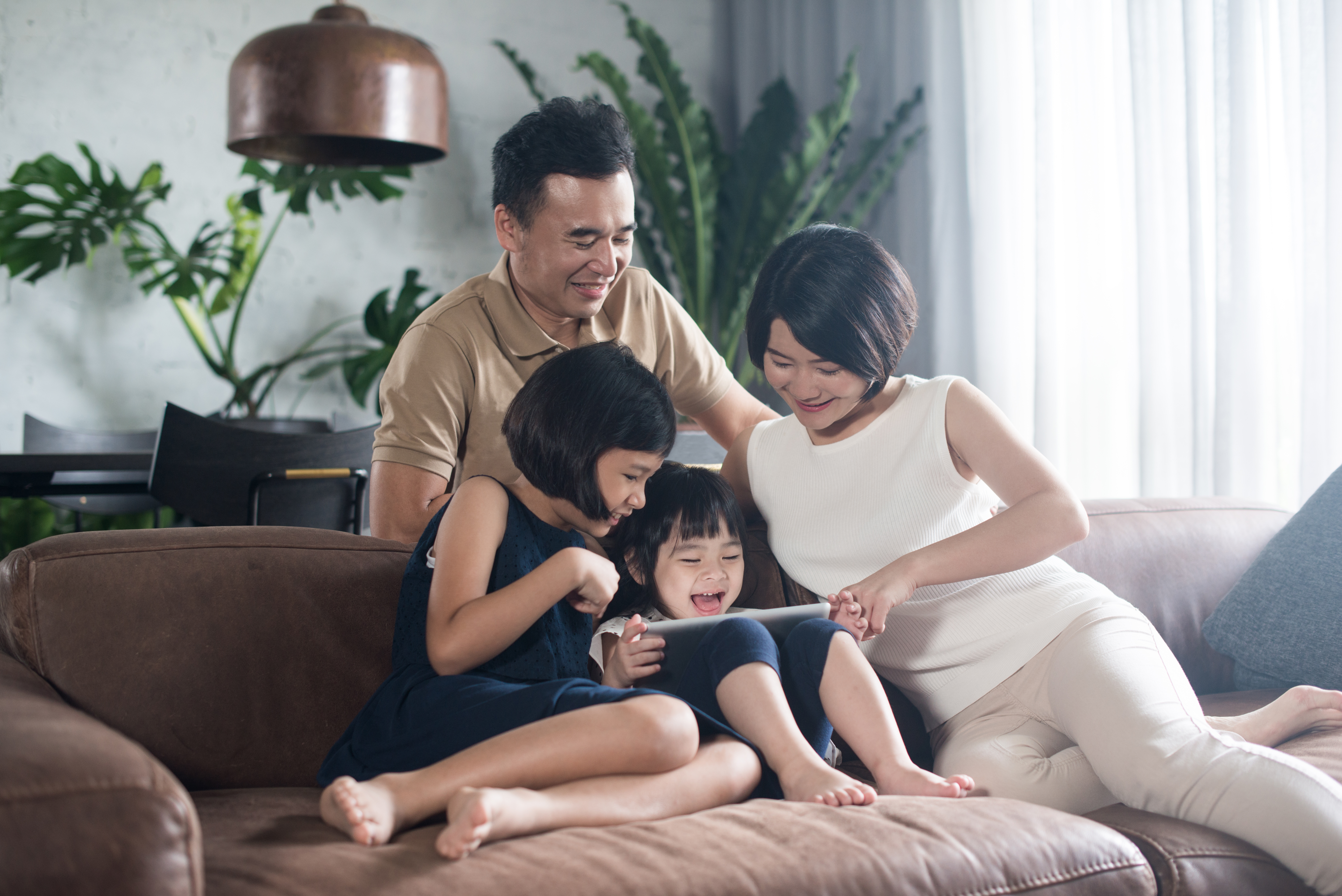 Asian family spending time together at home