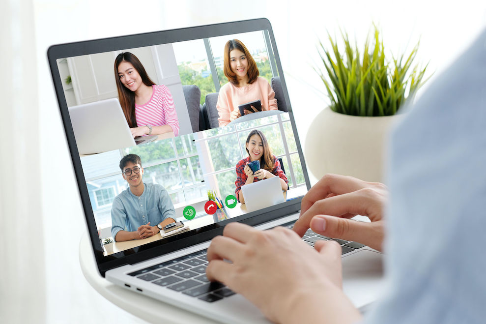 Virtual video conference work from home brainstorm planing teamwork asian business team making video call by web group of asia team online telecommunication meeting by laptop computer